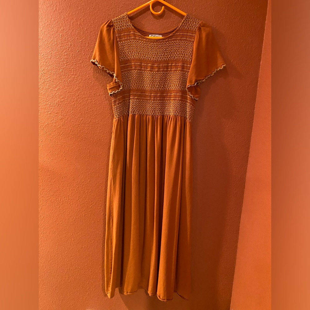 Beautiful copper colored dress! Size L (true to size) dress only worn 1 time.